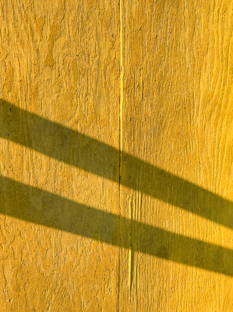 background of old yellowish plywood surface board.の写真素材