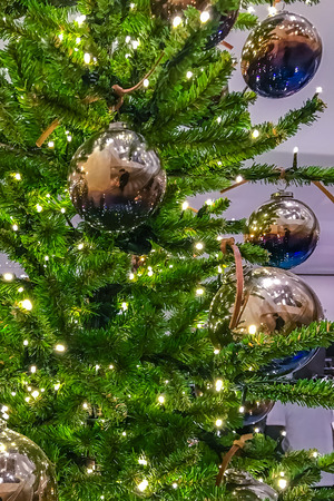 Christmas tree decorations, cones and glass bowl.の写真素材