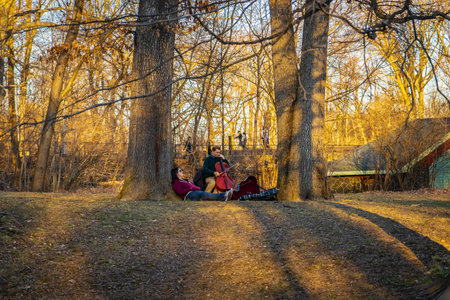 Prospect park, Brooklyn, NY February 19, 2017 The man playing the cello among the trees.