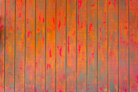 Fence of old painted boards background closeupの写真素材