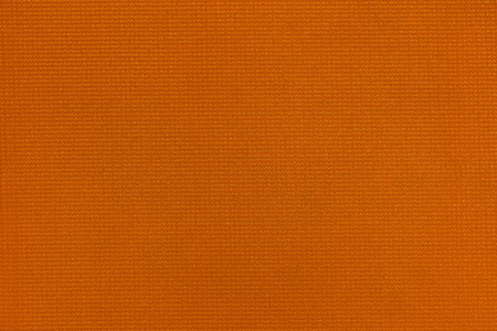 High resolution orange plastic fabric texture for background.の写真素材