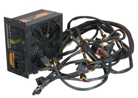 Computer high power supply for gaming and cryptocurrency mining on insulated white background.の写真素材