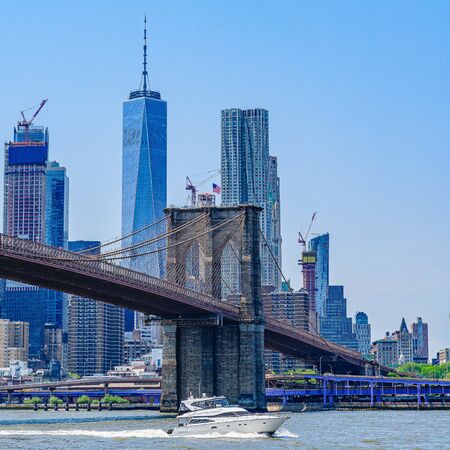 Brooklyn Bridge with lower Manhattan skyline, One World Trade Center in New York City.の写真素材