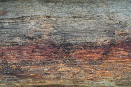 Old wooden board, background texture red yellow.の写真素材