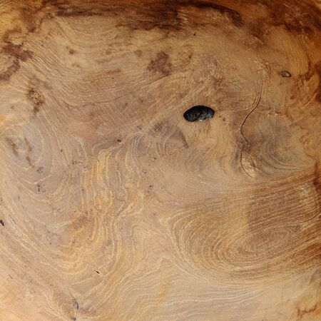 Light brown wooden texture background polished wood surface with a hollow.の写真素材