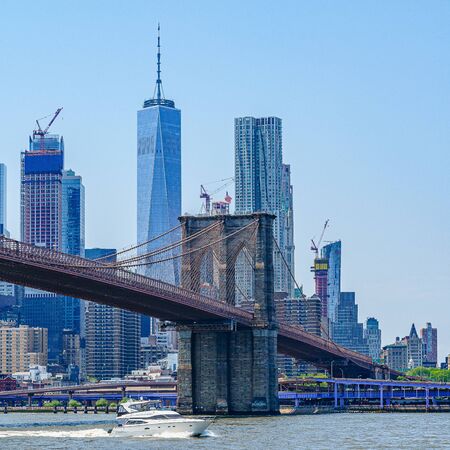 Brooklyn Bridge with lower Manhattan skyline, One World Trade Center in New York City.の写真素材