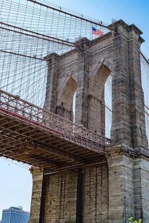 Brooklyn bridge in New York City with beautiful blue sky in backgroundの写真素材