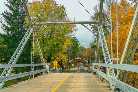 Dingmans Ferry Bridge across the Delaware River in the Poconos Mountains, connecting the states of Pennsylvania and New Jersey, USAの写真素材