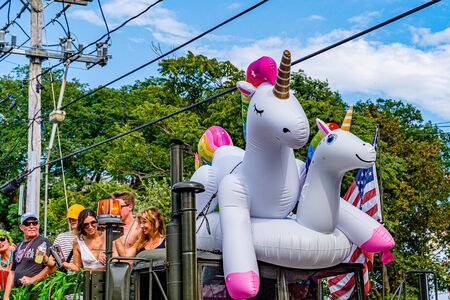 Provincetown, Massachusetts US - August 22, 2019 People walking in the Annual Provincetown Carnival Parade on Commercial Streetのeditorial素材