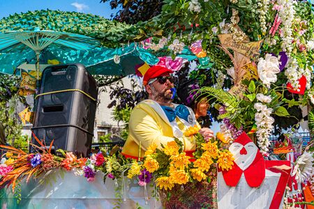 Provincetown, Massachusetts US - August 22, 2019 People walking in the Annual Provincetown Carnival Parade on Commercial Street.のeditorial素材
