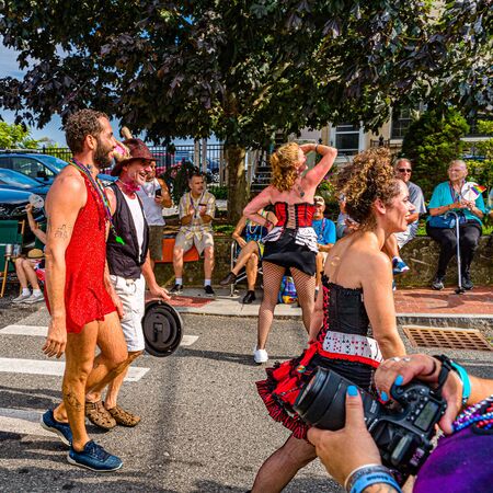 Provincetown, Massachusetts US - August 22, 2019 People walking in the Annual Provincetown Carnival Parade on Commercial Streetのeditorial素材