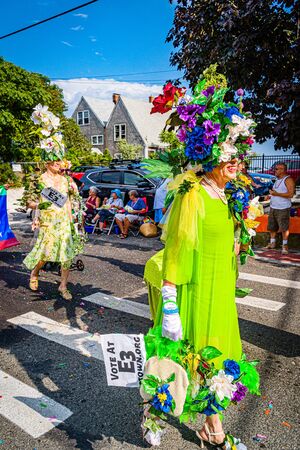 Provincetown, Massachusetts US - August 22, 2019 People walking in the Annual Provincetown Carnival Parade on Commercial Streetのeditorial素材