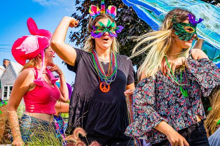 Provincetown, Massachusetts US - August 22, 2019 People walking in the Annual Provincetown Carnival Parade on Commercial Streetのeditorial素材