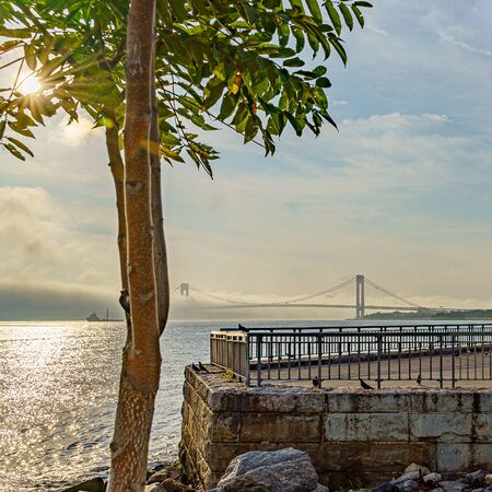 Beautiful waterfront, sky and clouds view of Gravesend Bay in Brooklyn, New York, USの写真素材