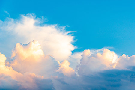 White clouds with blue sky on the sunset summer background.の写真素材
