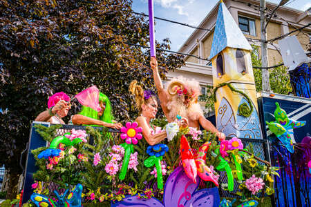 Provincetown, Massachusetts US - August 22, 2019 People walking in the Annual Provincetown Carnival Parade on Commercial Streetのeditorial素材