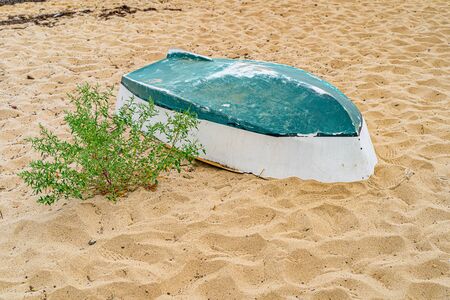 Upturned boat in the sand in the Provincetown Marina Cape Cod Provincetown MA USの写真素材