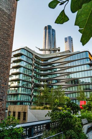 Manhattan, New York, USA - August 29, 2019: High Line Park in Manhattan. View of the surrounding houses and parks. High Line is a popular linear park built on elevated railway tracks.の写真素材