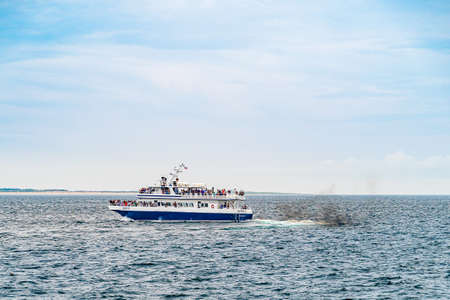 Provincetown, Cape Cod, Massachusetts, US - August 21, 2019 Ship and his crew looking for a whaleのeditorial素材