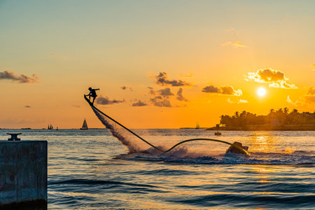 Flyboard Extreme, Man Flyboarding at Sunset, Key West South Floridaの写真素材