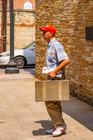 Savannah, Georgia USA - September 10 2019: artist as Forrest Gump on the streets of Savannah,...