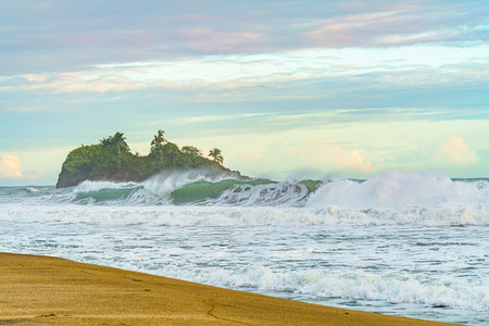 Sunrise at Playa Cocles, beautiful tropical Caribbean beach, Puerto Viejo, Costa Rica east coast and island Coclesの写真素材