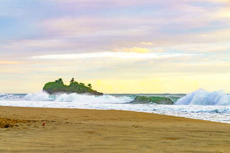 Sunrise at Playa Cocles, beautiful tropical Caribbean beach, Puerto Viejo, Costa Rica east coast and island Coclesの写真素材