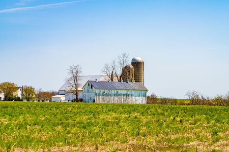Amish country, farm, home and barn on field agriculture in Lancaster, Pennsylvania, PA US North...