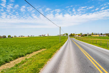 Amish country, farm, home and barn on field agriculture in Lancaster, Pennsylvania, PA US North Americaの写真素材