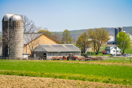 Amish country, farm, home and barn on field agriculture in Lancaster, Pennsylvania, PA US North Americaの写真素材