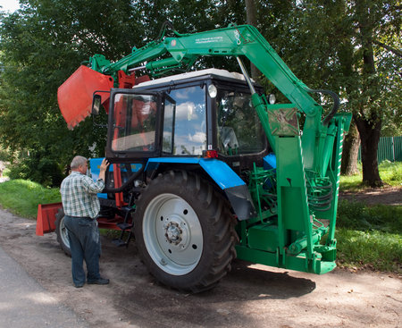 Driver tractors on rural road