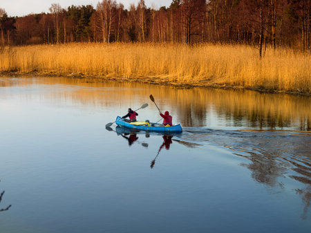 Sosnovy Bor, Russia - April 7, 2016: Tourists floating on the river Kovash Leningrad region by kayak
