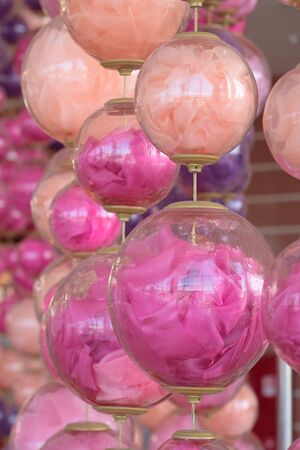 Glass balls with colored fabric for interior decorationの写真素材