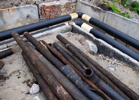 Replacement of old heating pipes with new onesの写真素材