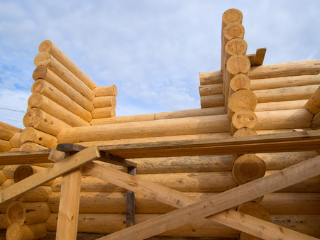 Fragment of stacking logs in the manufacture of logsの写真素材