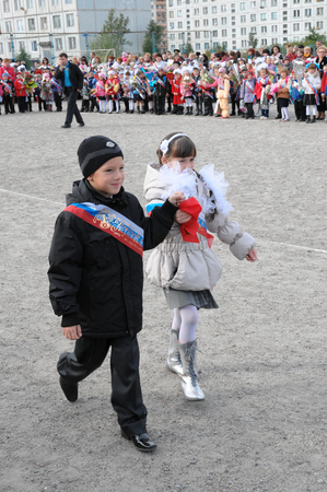 Gadjievo, Russia - September 1, 2010: School bell on the solemn construction of the first of Septemberのeditorial素材