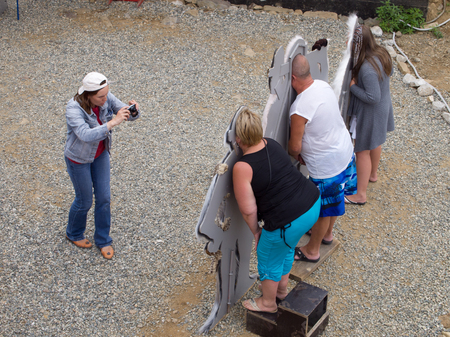 Sochi, Russia - August 05, 2011: Photographer shoots people in the sceneryのeditorial素材