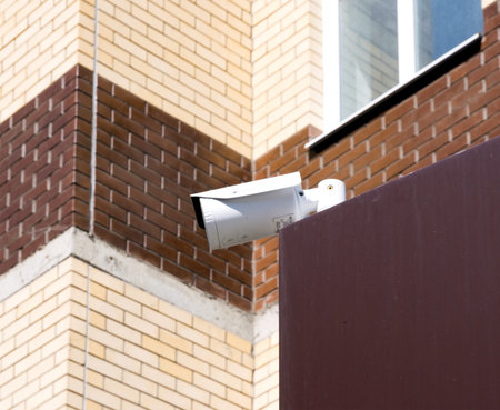 Surveillance camera mounted on the visor of the building