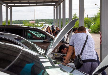 Voronezh, Russia - July 17, 2018: Inspection of cars in the traffic police before registrationのeditorial素材