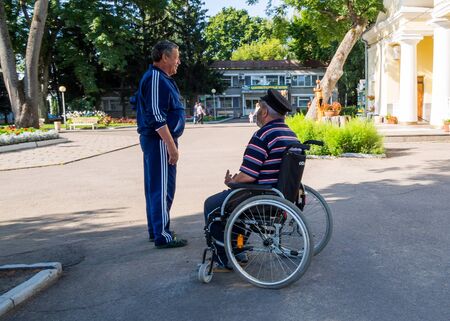 Voronezh, Russia - August 20, 2018: A man talking in a city parkのeditorial素材