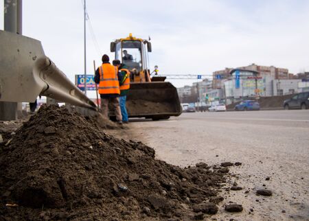 Voronezh, Russia - March 15, 2019: A pile of sand and road debris collected on the roadsideのeditorial素材