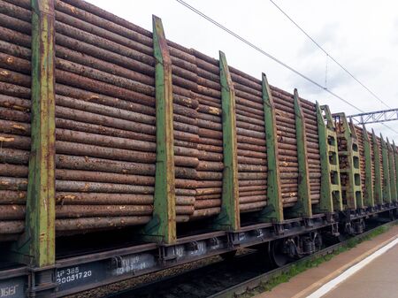 Murmansk, Russia - June 07, 2018: Railway platform loaded with logsのeditorial素材