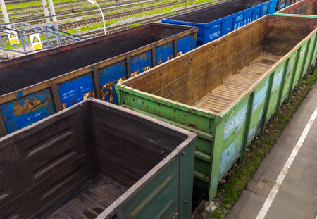 Murmansk, Russia - June 07, 2018: Railway train with empty wagons for coal transportation