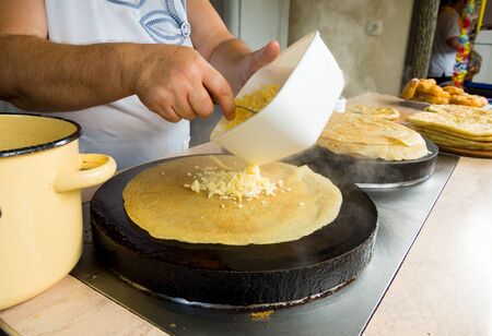 The process of making tortillas (khychin) with fillingの写真素材