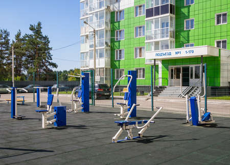 Voronezh, Russia - August 29, 2019: Sports ground with exercise machines in the courtyard of a residential buildingのeditorial素材