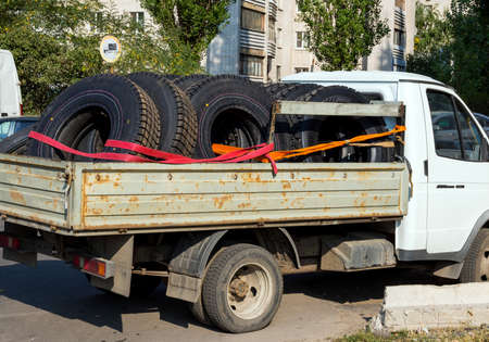 Voronezh, Russia - September 4, 2019: Body full of new car tires for trucksのeditorial素材