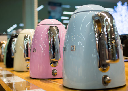 Voronezh, Russia - December 22, 2019: Standing in a row, new plastic electric kettles