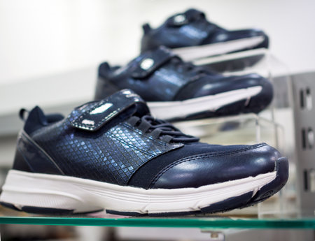 Voronezh, Russia - February 29, 2020: New sneakers on display in a shop windowのeditorial素材