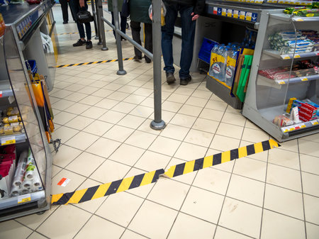 Voronezh, Russia - March 21, 2020: Marking for keeping the distance in the checkout area of the storeのeditorial素材