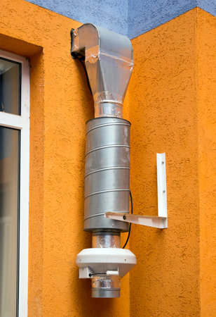 The ventilation device is mounted at the apartment windowの写真素材